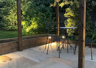 Cozy outdoor dining area with lighting